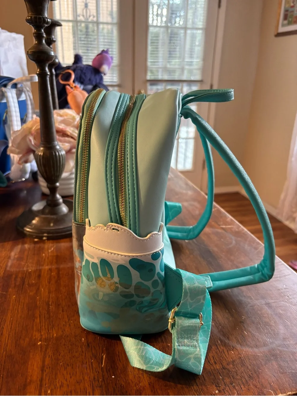 Loungefly Teal Moana Mini Backpack with Pink Character Accent